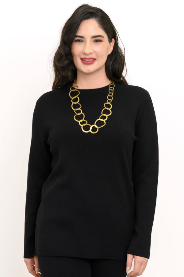 Women's ebony-toned tunic top with long sleeves and a crew neck, styled with gold jewelry on a white backdrop.