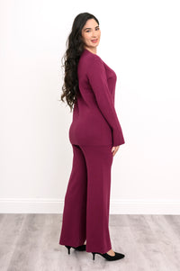 Back view of a maroon crew neck cotton sweater, showcasing a generous rectangular cut and smooth back drape.