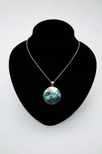 Sterling silver necklace with abalone pendant displayed on a black jewelry bust