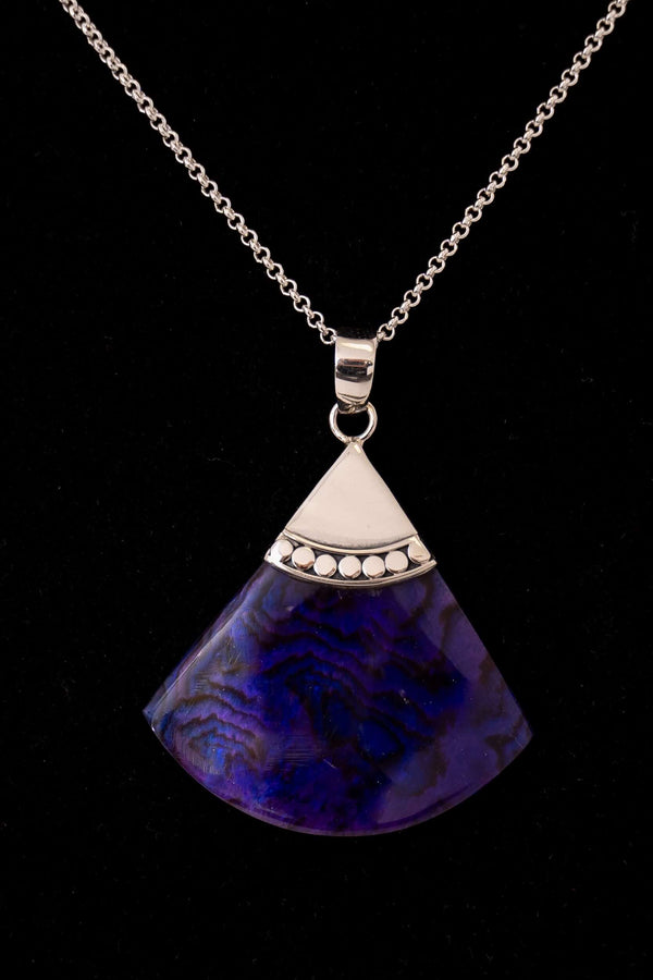 Sterling silver necklace with triangular top and deep blue patterned pendant