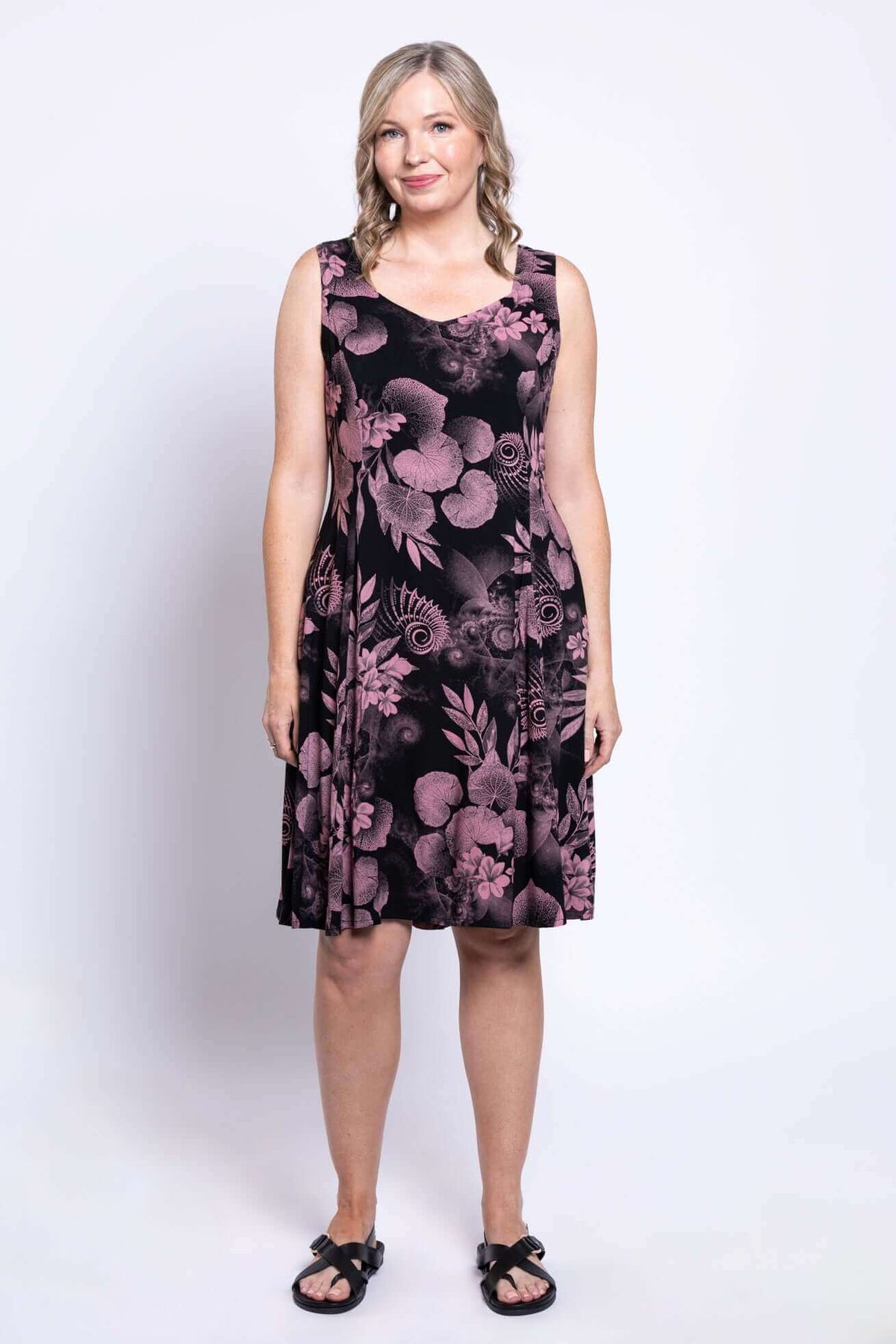 Front studio shot of Sweet Sara summer dress in pink botanica print