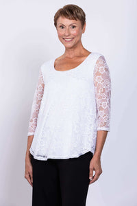 Three-quarter front view of model in Ellen Top with lace detail