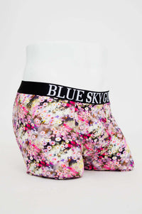 Three-quarter view of floral print men's boxer briefs with supportive waistband