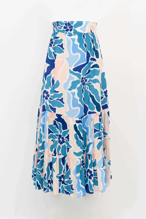 Colorful tiered maxi skirt with blue floral print and elastic waistband
