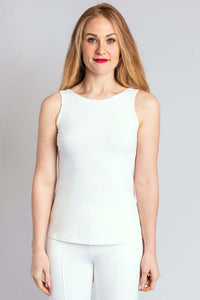 Woman wearing a white bamboo reversible tank with round neckline, front view