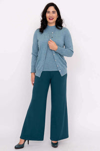 Woman modeling blue Kitten Cardigan and teal wide-leg pants full outfit