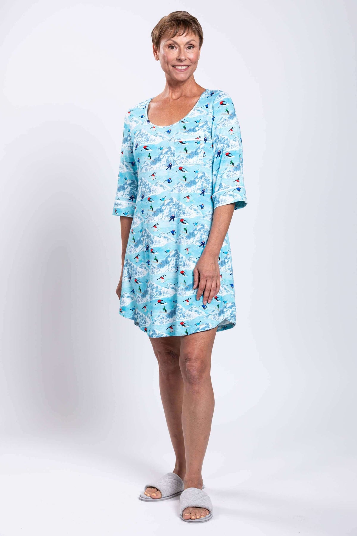 Woman modeling blue bamboo sleepshirt, standing with arms relaxed, front view