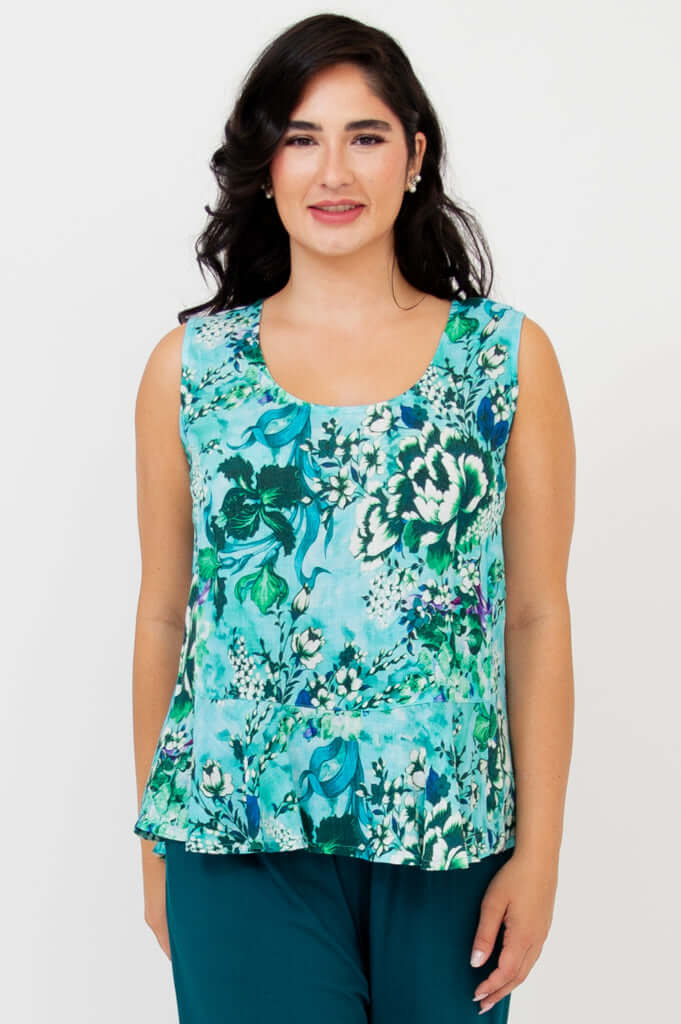 Front view of woman wearing Ginny Tank in teal floral print