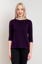 Women's short purple 3/4 sleeve sweater with boat neckline.