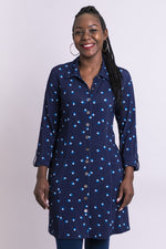 Women's shirt collar blue print tunic dress shirt with buttons and pockets.