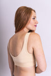 Women's beige workout bra made with all sustainable and natural fibers for ideal comfort and support.