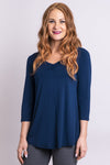 Women's casual indigo blue plus-size 3/4 sleeve shirt with V-neck and flowy cut. Made with natural sustainable and stretchy fibers.