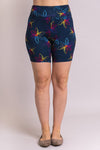 Women's navy blue daisy print biker shorts for yoga, workout, or casual wear. Made with comfortable, stretchy, and sustainable natural fibers.
