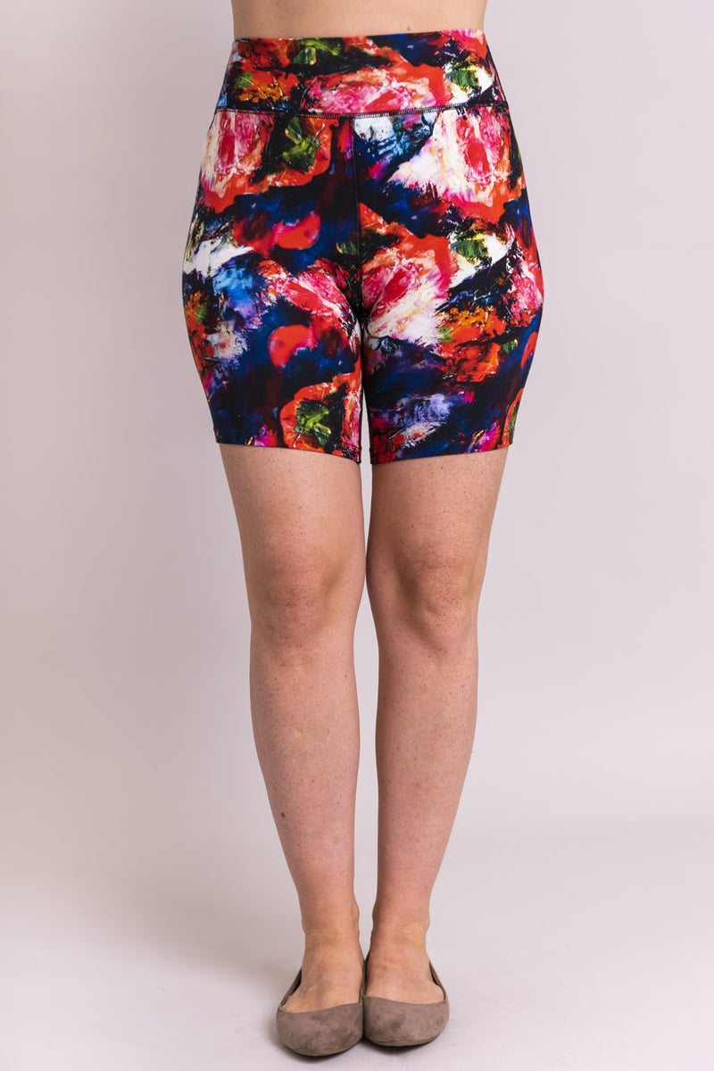 Women's coral abstract print biker shorts for yoga, workout, or casual wear. Made with comfortable, stretchy, and sustainable natural fibers.