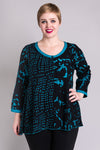 Women's blue batik art long-sleeve loose fitting blouse with V-neck.