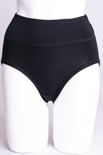 Women's comfortable black high waisted underwear control briefs made with natural bamboo fibers.