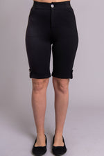 Women's black knee-length stretchy shorts with pockets and buttons, made with natural bamboo fibers. 