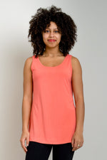 Women's coral pink spring/summer casual flowy tank top with wide shoulder strap and U-neckline.