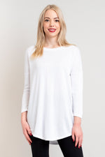 Women's long white 3/4 sleeve sweatshirt with round neckline.