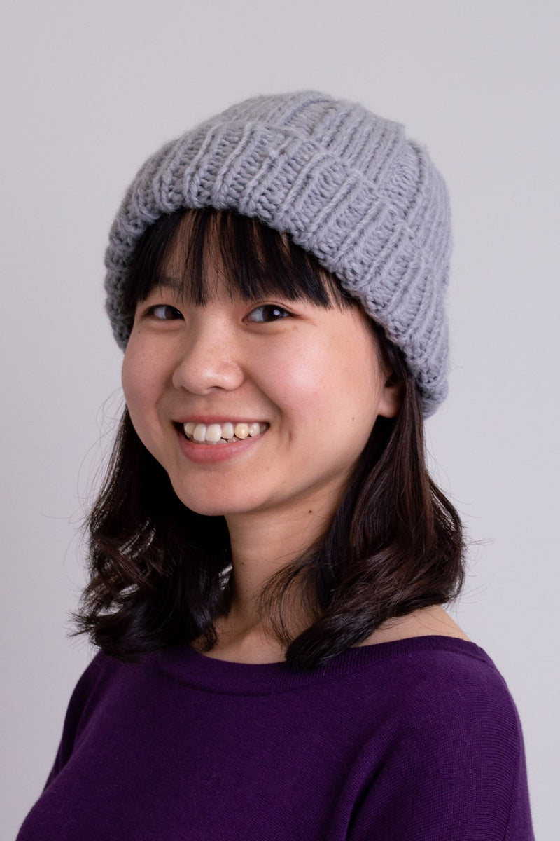 Women's grey knit toque wool beanie hat.
